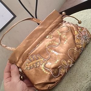 Golden floral design purse